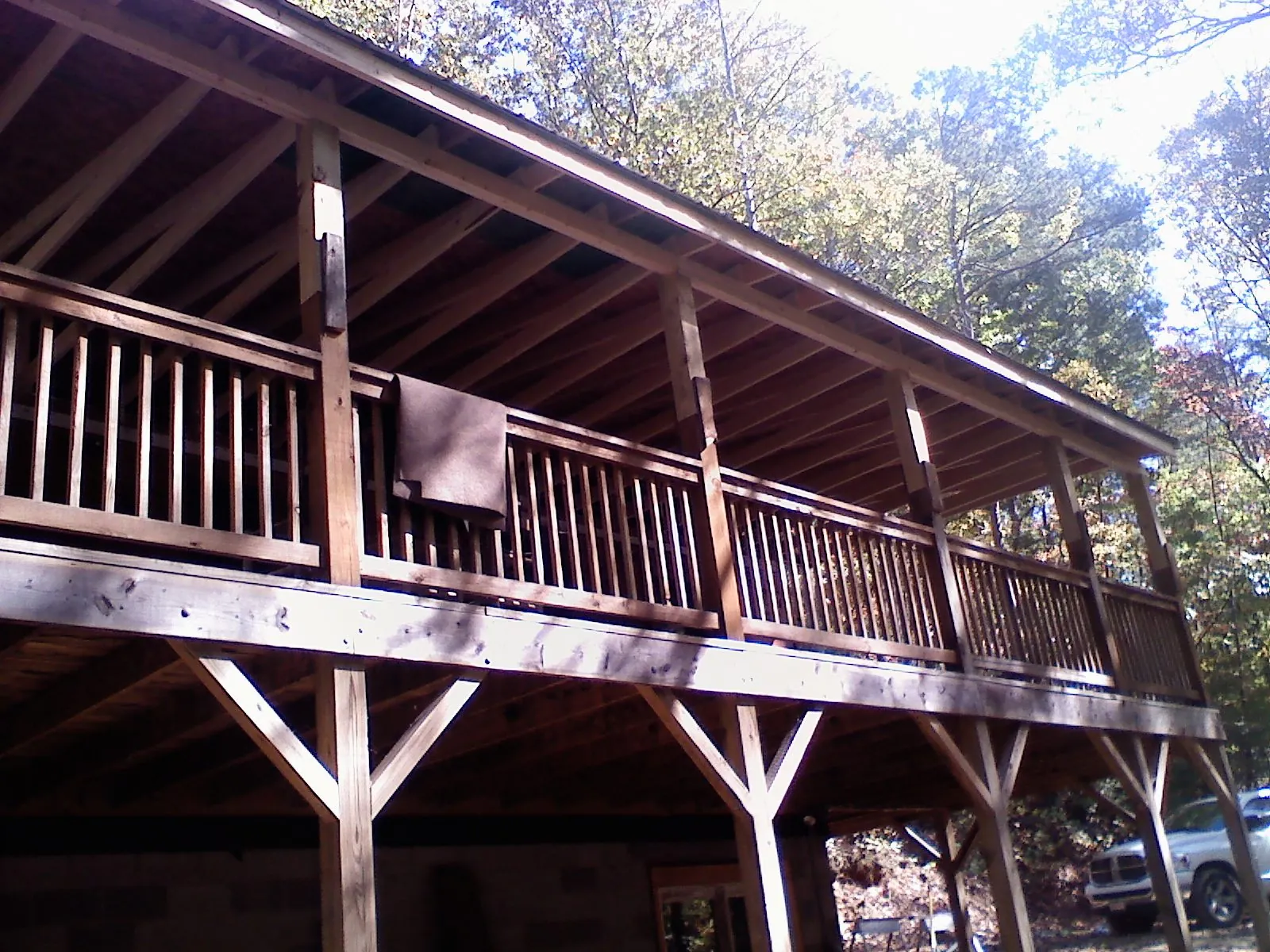 Timber framing under a new elevated porch and deck — Roof Leak Repair in Potsdam by Roofing Brothers
